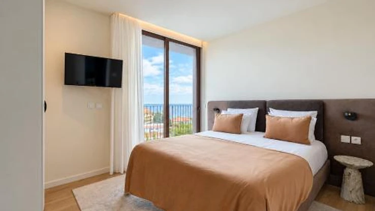 One-Bedroom Apartment with Balcony & Sea View