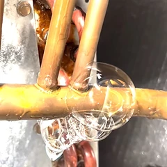 Evaporator coil leak detection showing bubbles at the joint