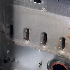 Cracked furnace burner box discovered during a heating inspection