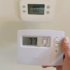 Digital thermostat installation by an Alltech HVAC technician