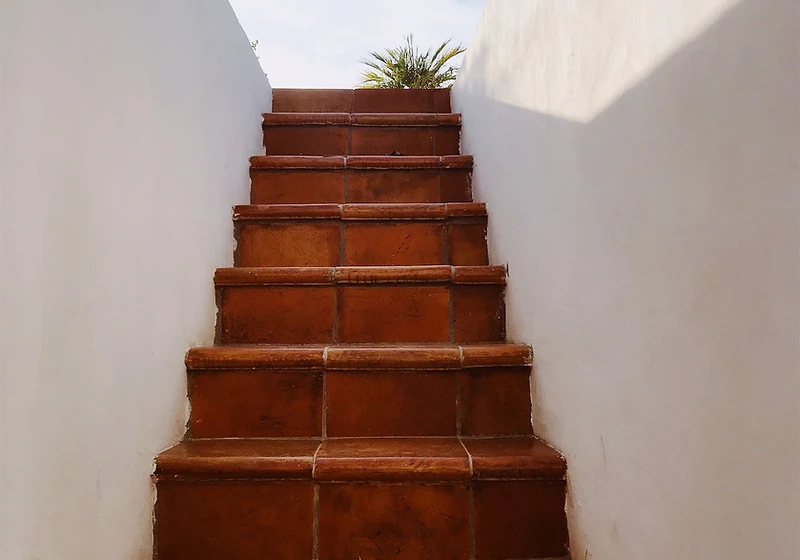 Extreme close-up of a handmade Saltillo terracotta tile edge