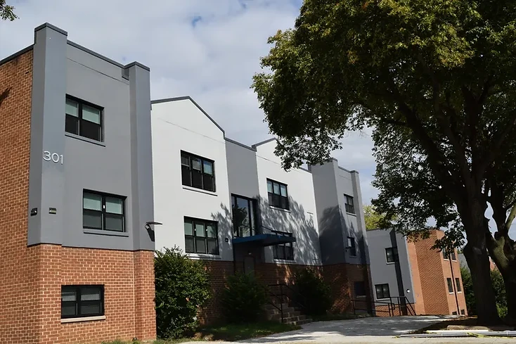 Completed exterior with new facade finish and energy efficient windows, Christiana Village Apartments, Wilmington Delaware
