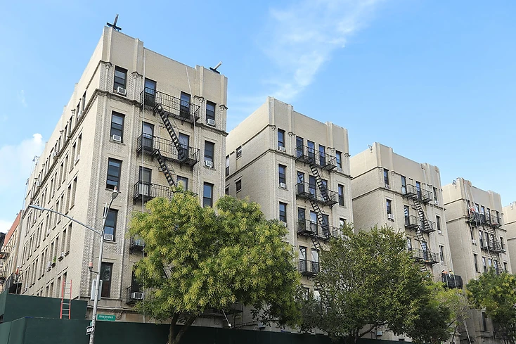 Apartment buildings on Amsterdam Avenue during active renovation, Upper Manhattan