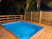 The pool lit up as night falls