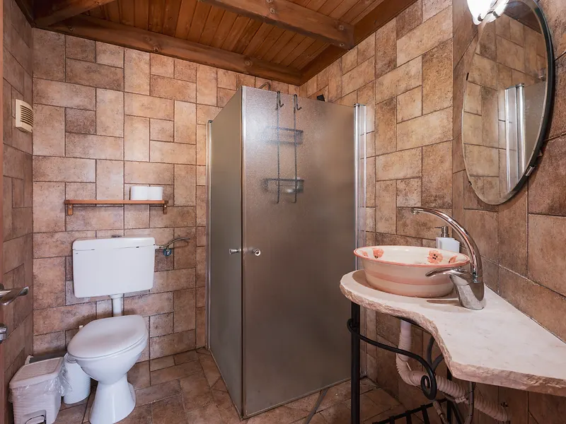 Cabin Bathroom with Stone Sink