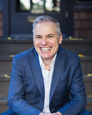 Portrait of Patrick Lencioni, Founder & President of The Table Group, Organizational Health Expert