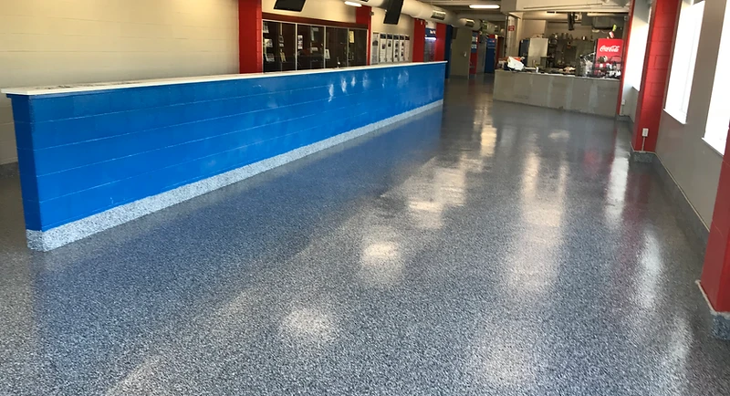 High-gloss epoxy floor installation by GoBright