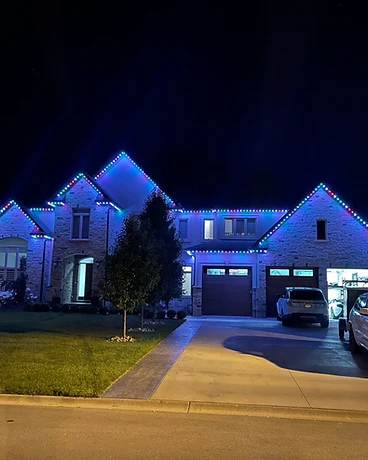 Stone Estate — Multicolour Roofline — GoBright permanent lighting installation