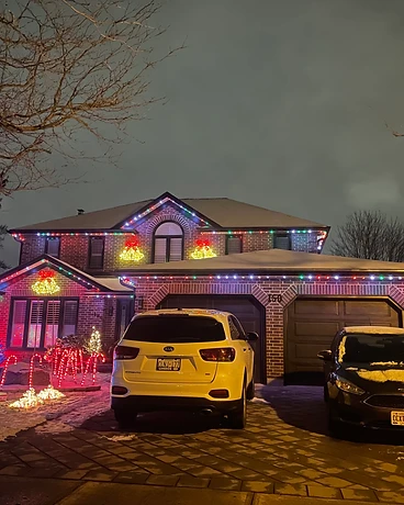 Brick Home — Winter Roofline — GoBright permanent lighting installation