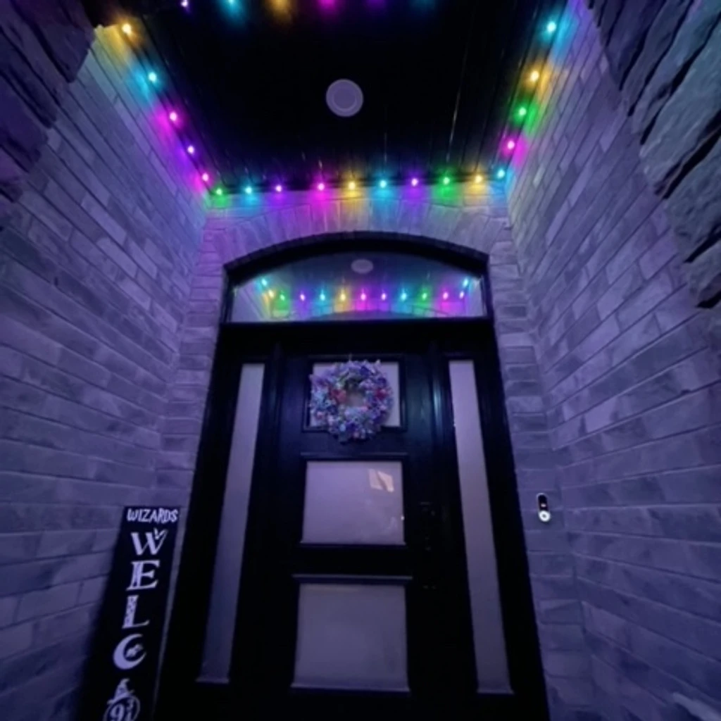 Front entry detail with color-changing permanent LED soffit lighting