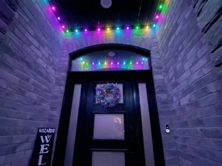 Front entry detail with color-changing permanent LED soffit lighting