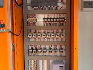 DIN-rail layout — PSU, contactors, VFD drive