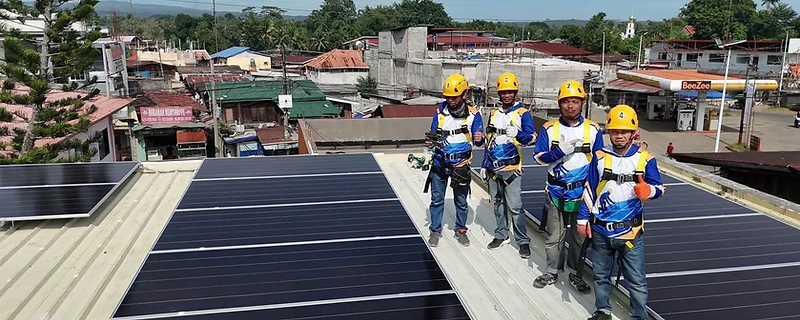 CEED SOLAR crew installing a rooftop solar array in Baloi, Lanao Del Norte