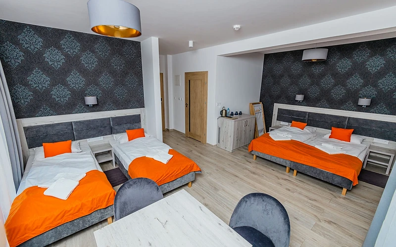 Pokoje i apartamenty