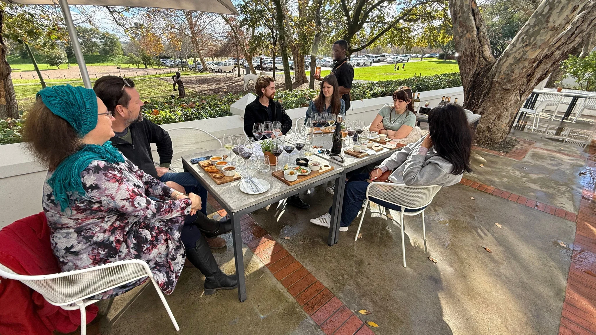 Wine in the Cape guide pouring for guests in a small-group setting