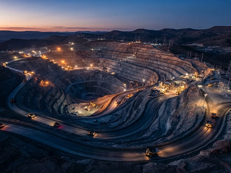 Aerial view of an open-cut mining operation at twilight