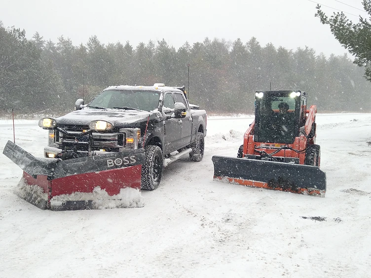 Tor Snow Removal truck and skid steer team