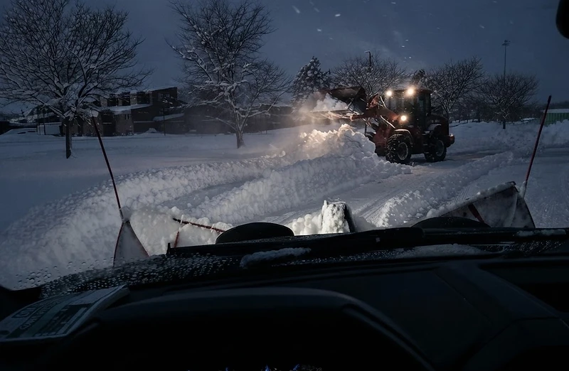 Tor Snow Removal operation at dusk