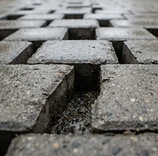 Block paving joints depleted and open after pressure cleaning, before re-sanding