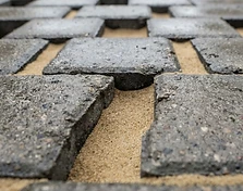 Block paving joints refilled with kiln-dried sand after re-sanding