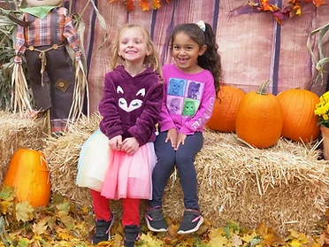 Best friends on the hay bales