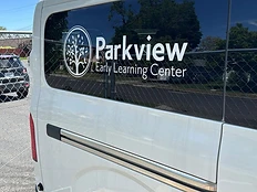 The Parkview van with its logo in the window