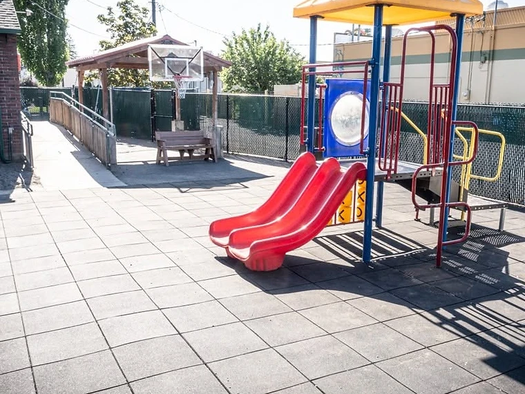 The playground structure beside our covered pavilion