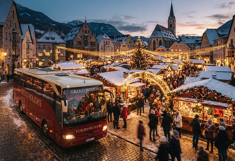 Ridlers coach at a Christmas market at dusk