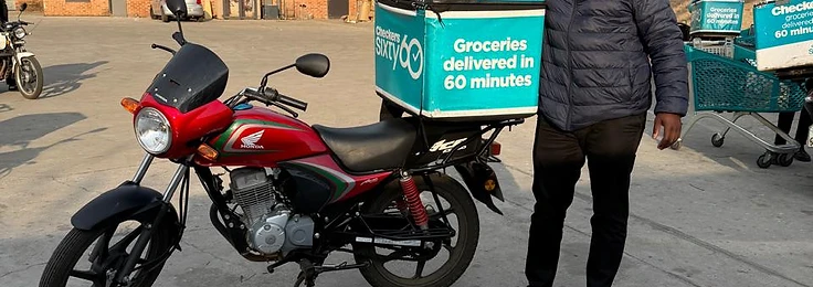 Scooter Lab delivery rider with a Honda Ace fleet motorcycle in Potchefstroom