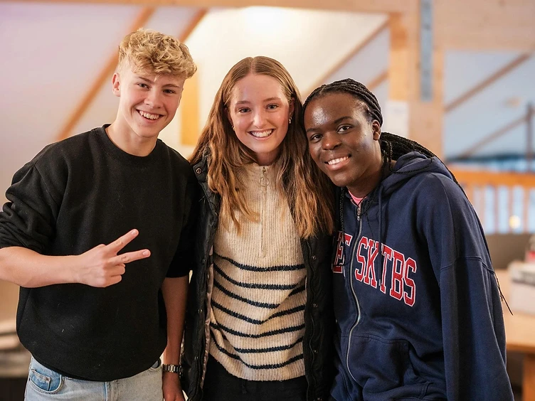 A group of young people smiling together, representing the youth Right Step serves