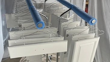 Cabinet doors drying in professional rack with protection Indiana