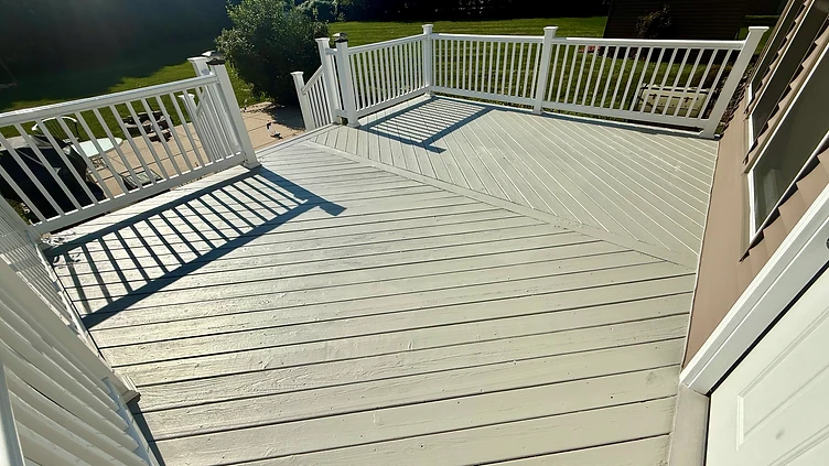 Wooden deck restored with uniform light grey stain Indiana