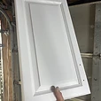 Freshly painted white cabinet door with smooth satin finish Northwest Indiana