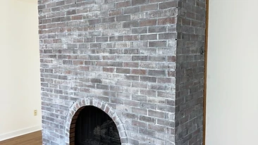 Brick fireplace white wash finished result Indiana