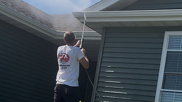 Pressure washing exterior siding and gutters Indiana
