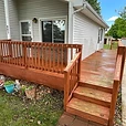 Completed deck staining with rich reddish brown finish Northwest Indiana