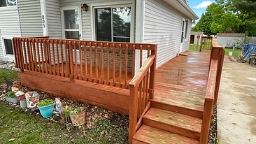 Completed deck staining with rich reddish brown finish Northwest Indiana