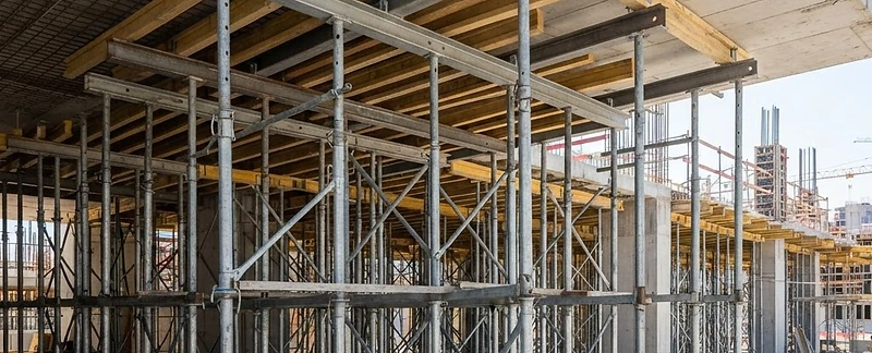 Steel shoring posts supporting an elevated concrete slab