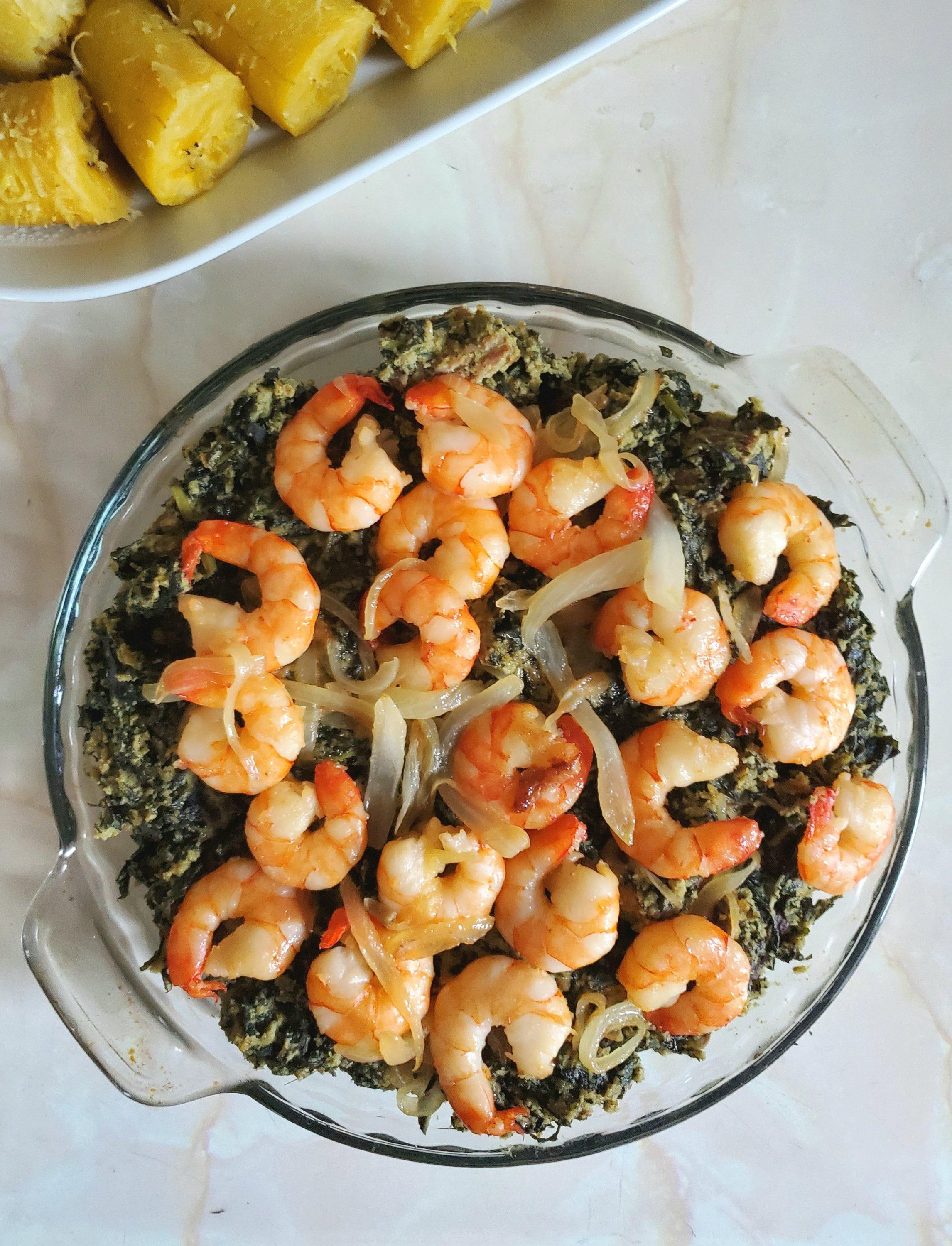 Cameroonian ndolé stew with peanuts and shrimp