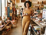 An African woman entrepreneur in her boutique