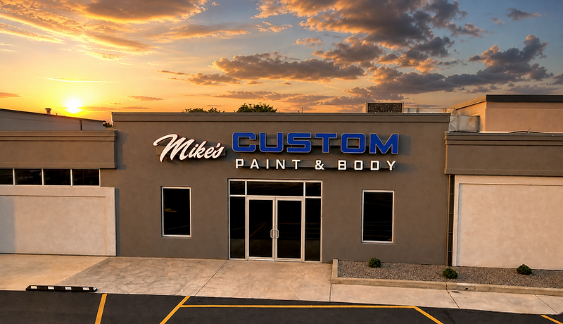 Mike's Custom Paint & Body shop front at sunset