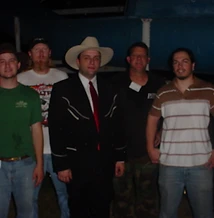 Five men posing together outdoors at night at JescoFest 2006
