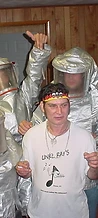 8-BIT crew in silver fire suits with an Unkl Ray's crew member at JescoFest 2006