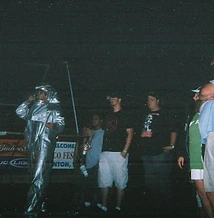 8-BIT performers in silver fire suits with spectators at JescoFest 2006