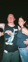 Three festival goers posing together at night at JescoFest 2006