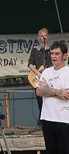 Tazz Toni with arms crossed on the Festival of the Rivers stage at JescoFest 2006