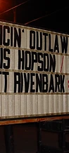 Marquee sign reading Dancin Outlaw Fri Sat Sun at JescoFest