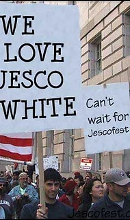 Fans holding handmade Jesco White protest signs at JescoFest