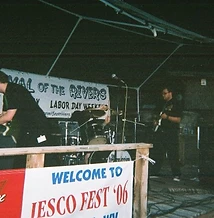 The Transmission performing on the wooden stage at night at JescoFest 2006