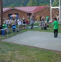 Crowd gathered around the concrete slab watching Jesco and J. Glenn at JescoFest 2006